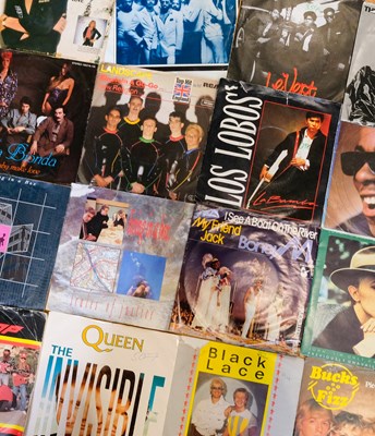 Lot 674 - A group of 45 rpm vinyl record singles,...