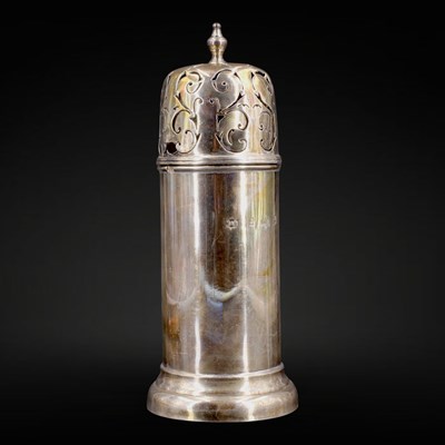 Lot 1117 - An Edwardian lighthouse form silver sugar...