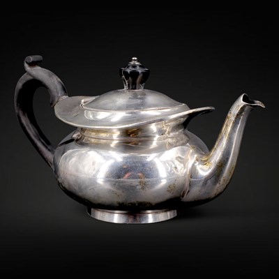 Lot 1120 - An Edwardian bachelor's silver teapot, of...