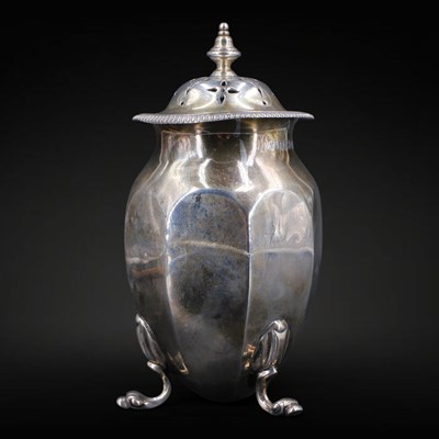 Lot 1122 - A George V silver pepperette or caster, having...