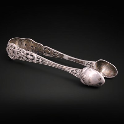 Lot 1135 - A set of Victorian silver sugar tongs, having...
