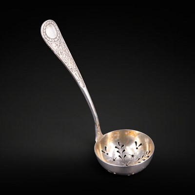 Lot 1136 - A Victorian silver sifting spoon, James Dixon...