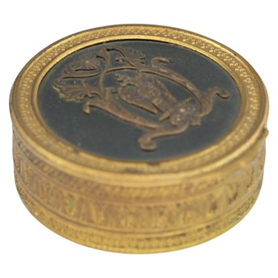 Lot 874 - A Napoleonic French gilt- and patinated-brass...