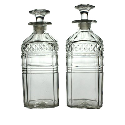 Lot 1098 - A pair of late Georgian cut glass spirit...