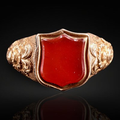 Lot 1311 - A Victorian carnelian and 9 ct gold signet...