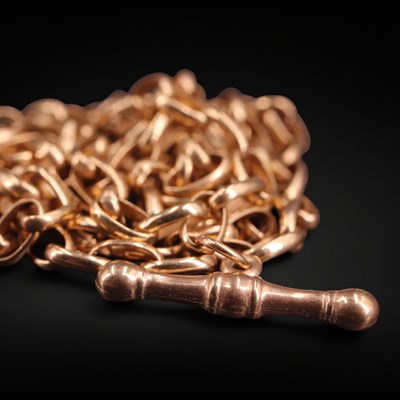 Lot 1253 - A 9 ct gold curb link neck chain with T-bar...