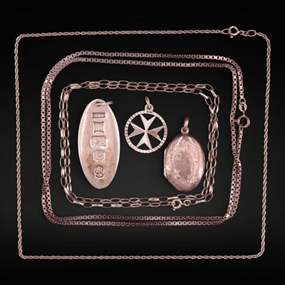 Lot 1218 - A heavy 1977 silver pendant, a white metal...