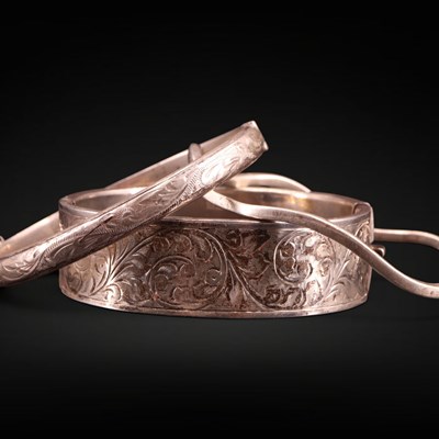 Lot 1219 - Three silver bangles, 52 g