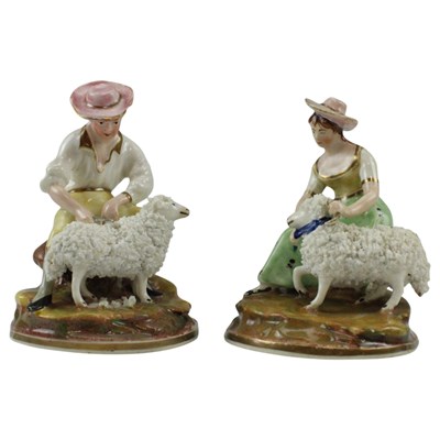 Lot 934 - A pair of 19th Century Staffordshire figures...