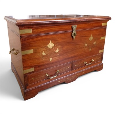 Lot 1437 - A brass-inlaid hardwood chest, having campaign-...