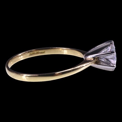Lot 1153 - A solitaire diamond ring, comprising a...