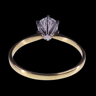 Lot 1153 - A solitaire diamond ring, comprising a...