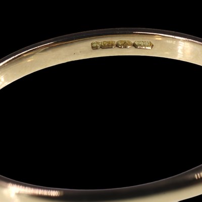 Lot 1153 - A solitaire diamond ring, comprising a...